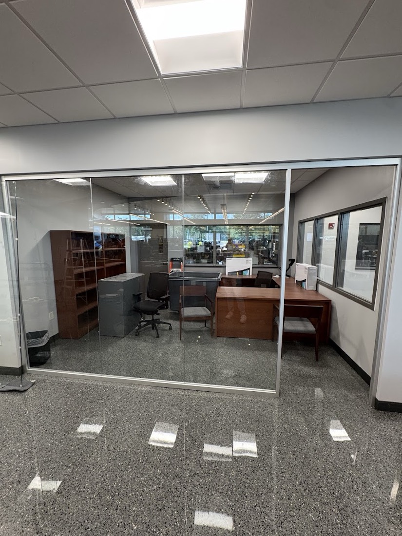 Executive office glass wall and sliding door at Union Terminal, Jacksonville
