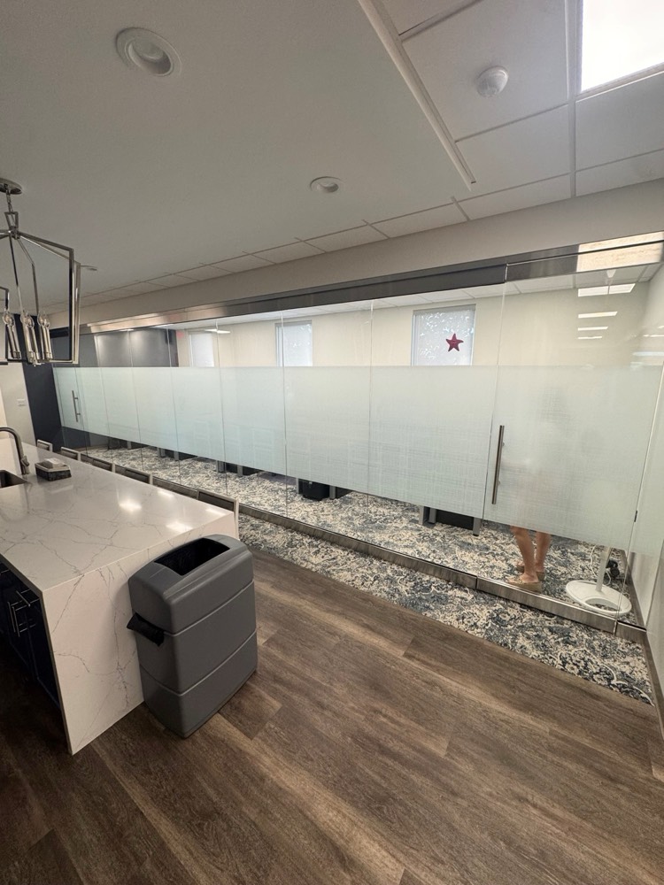 Frameless glass wall and doors with matching privacy film — ValuTeachers, Nocatee FL